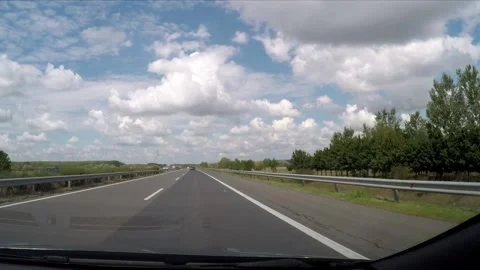 Driving a highway in the sunshine Stock Footage 172063549