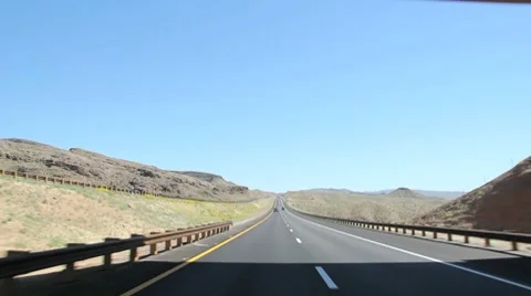 Driving on Highway under an overpass Stock Footage 7905759