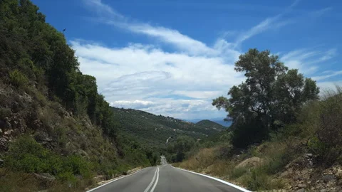 Driving holiday down a road to the coast. Stock Footage 244864720
