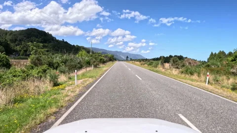 Driving hyperlapse - cliffside highway along coast in New Zealand Stock Footage 235715100