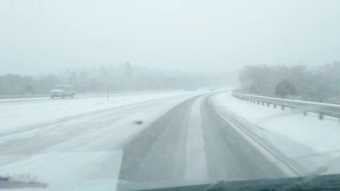 Driving on I-25 During a Blizzard Stock Footage 84154302