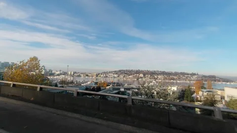 Driving on I-5 looking at the Seattle Space Needle Video stock 256267177
