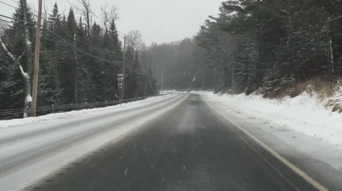 Driving On Icy Roads In Remote Forest in Winter Snow Storm POV Stock Video Stock Footage 58840785