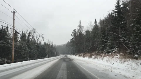 Driving On Icy Roads In Remote Forest in Winter Snow Storm POV 4K Stock Video Video stock 58840797