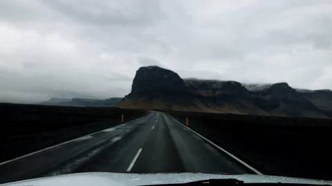 Driving inside a car through the mountain road in a cloudy day in Iceland Stock Footage 172337173