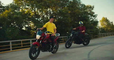 Driving instructor and his student are driving on a motorsport training ground Stock Footage 249606091