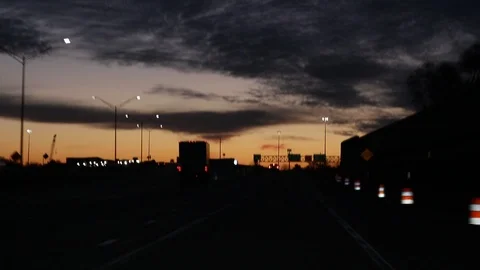 Driving onto Interstate I-75 with Sun Rising towards Metro Detroit 動画素材 127194647