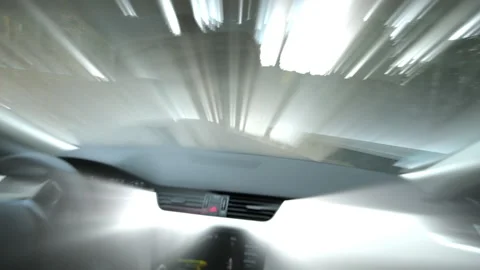 Driving on the iridescent rays of light - abstract vision from inside the car 動画素材 147538682