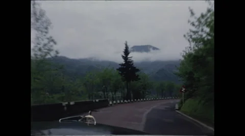 Driving in Italy with Mountain View Stock Footage 47970928