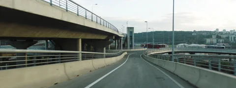 Driving on junction arm to roundabout Stock Footage 147162421