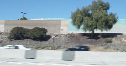 Driving on the LA Freeway, Driving Plate with Passing Cars in a City Video stock 253977057