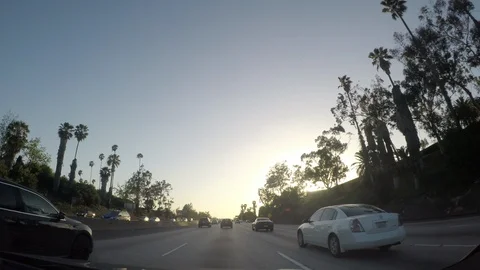 Driving in LA, going west on the 10 freeway at sunset. Stock Footage 96426978