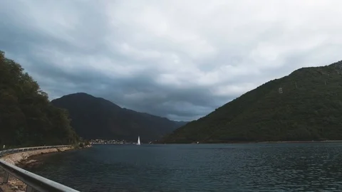 Driving by lake Stock Footage 129749553