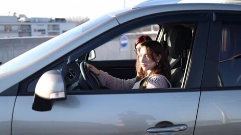 Driving lesson with instructor inside car 库存影片 332871913