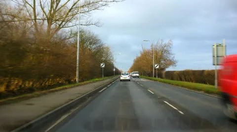 Driving on a long straight road Stock Footage 10722700