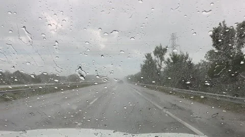 Driving with low visibility during heavy rain event Stock Footage 313143044