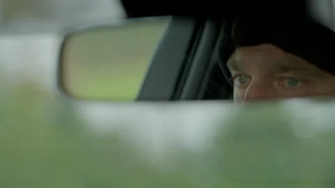 Driving man in Autumn, mirror reflection, 4K Stock Footage 299943316