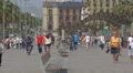 Driving a mini electric scooter on the sidewalk in Barcelona 4k or 4k+ Resolution