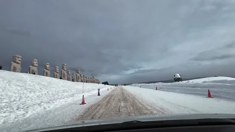 Driving into Moai Statue Sapporo winter with tourists Hokkaido 스톡 동영상 333205089