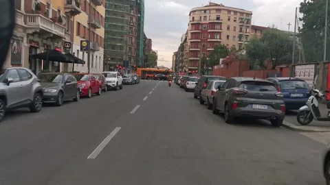 Driving moped in milano Stock Footage 233295197