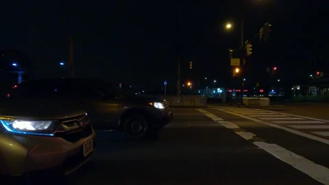 Driving motion shot with side view on dark city streets at night with buildings Video stock 149463081