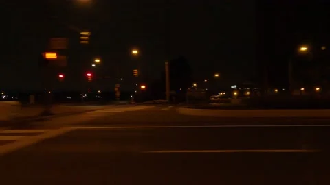 Driving motion shot with side view on dark city streets at night with buildings Video stock 149463290