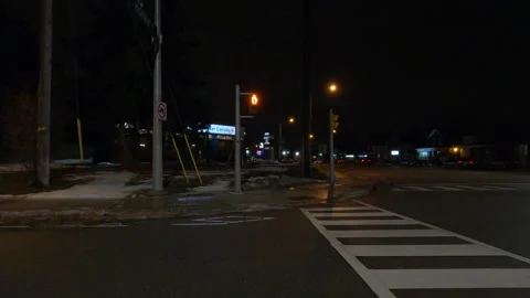 Driving motion shot with side view on dark city streets at night with buildings Vídeos de archivo 149780114