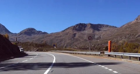 Driving on a mountain pass, Cinema 4k pov view driving on a road in the swiss Stock Footage 88311248