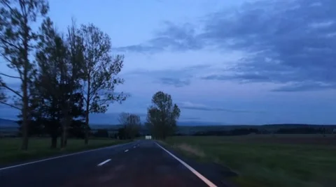 Driving on a mountain road in the evening blue light Stock Footage 63100744