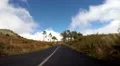 Driving mountain road to Pico Arieiro in Madeira with trees HD Footage