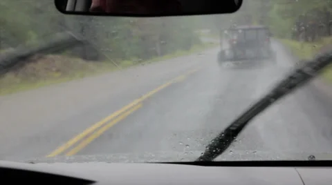 Driving on mountain road in rain Stock Footage 30399047