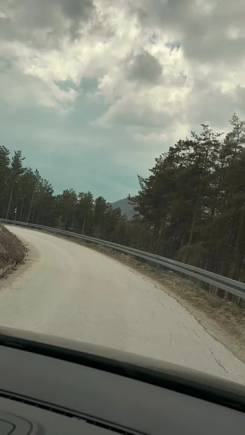 Driving on mountain road with rocky cliffs in Serbia scenic travel route POV Stock Footage 332230800