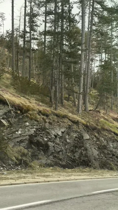 Driving on mountain road with rocky cliffs in Serbia scenic travel route POV Stock Footage 332230801