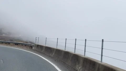 Driving on a mountain road with sharp curves Stock Footage 251678522