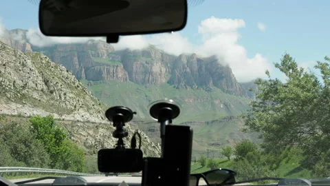 Driving on a mountain road view from the windshield of the car Stock-Footage 130889563