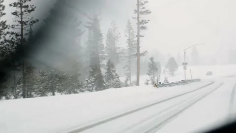 Driving on mountain road in winter Stock Footage 141452632