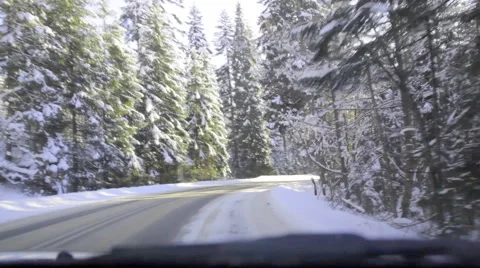 Driving on a mountain road in winter time Stock Footage 45976584