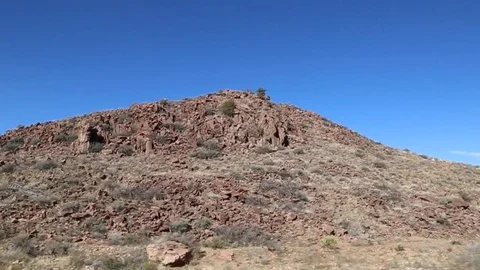 Driving by mountains in the desert 2 Stock Footage 109170408