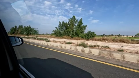 Driving on multiple lane highway and other side seen through a car window. Stock Footage 340532872