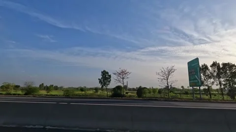 Driving on multiple lane highway and other side seen through a car window. Stock Footage 340533295