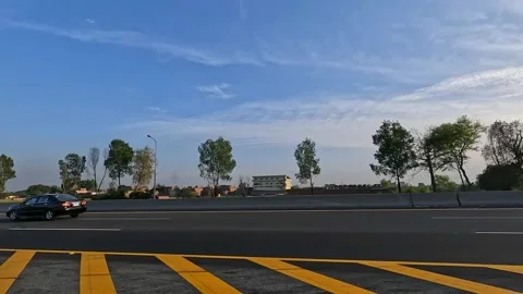 Driving on multiple lane highway and other side seen through a car window. Stock Footage 340533502