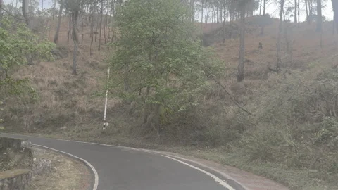 Driving on Narrow Mountain Path Between Hills Scenic View Stock Footage 330855757
