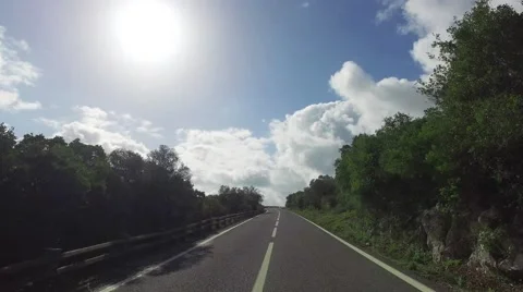 Driving on a Narrow Road in Mountains Video stock 60052592