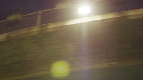 Driving near road structures at night Stock Footage 138101665