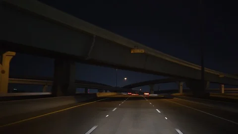 Driving at night on a large freeway 4k Stock Footage 94120385
