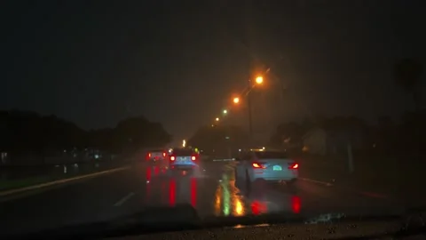 Driving at night in a rainstorm Stock Footage 220952065
