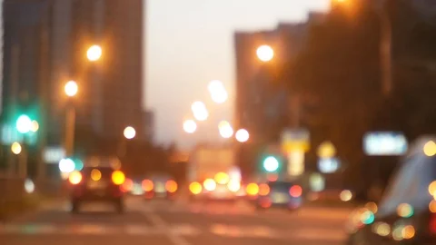 Driving at night. View the windshield and blurred cars in the city. window of Stock Footage 94125763