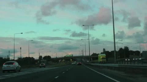 Driving north towards Tees flyover at sunset 動画素材 12590906