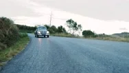 Driving A Old Classic Vintage Volkswagen Beetle In The Road Stock Footage