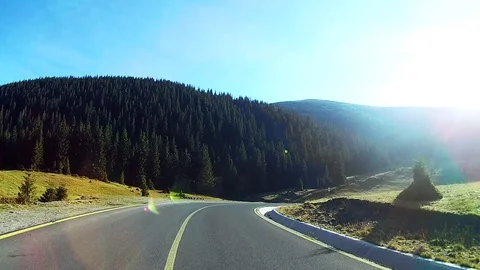 Driving on an open road in a valley in the mountains Stock-Footage 71490601